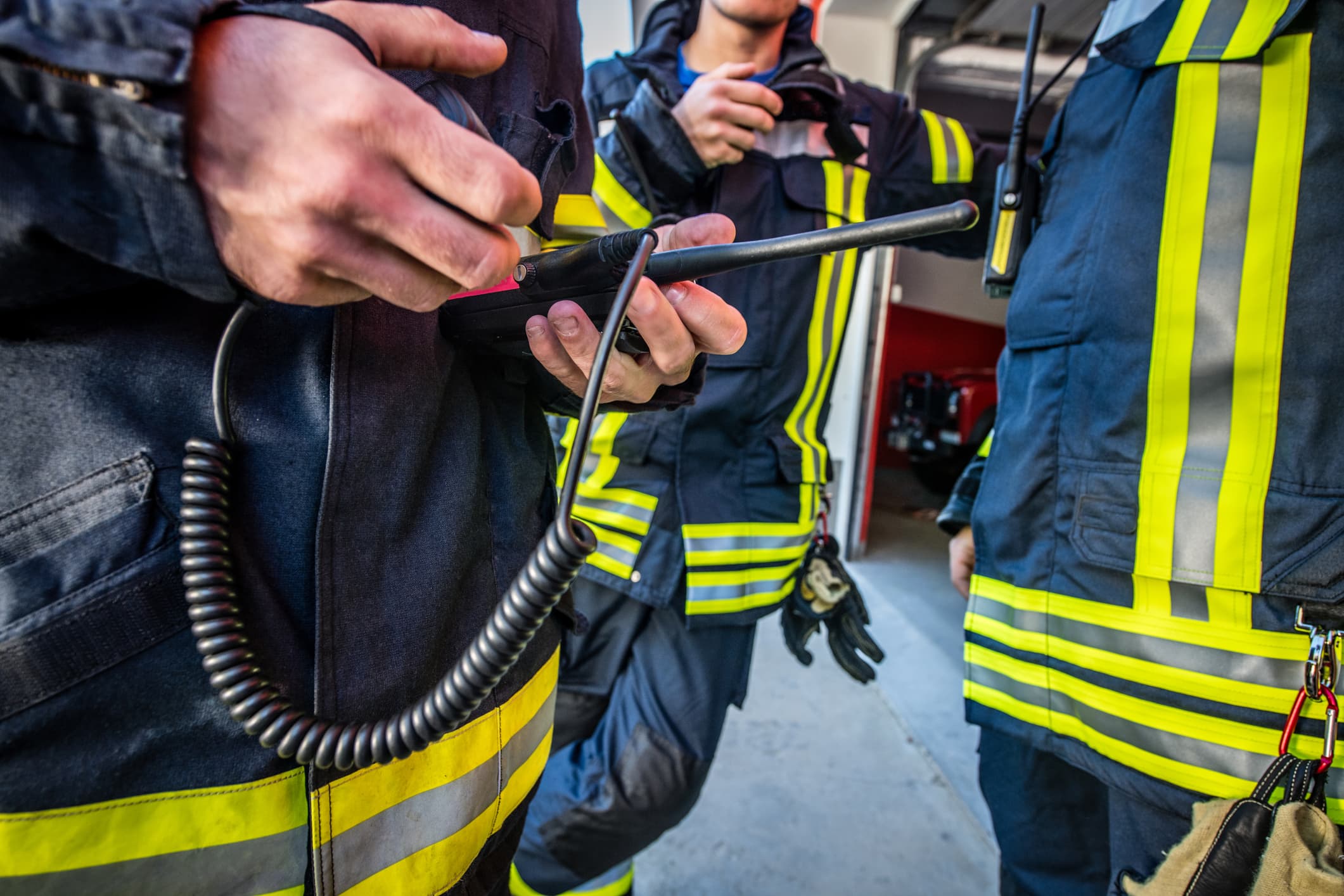 Firefighters using walkie talkie, rescue operation Close Up